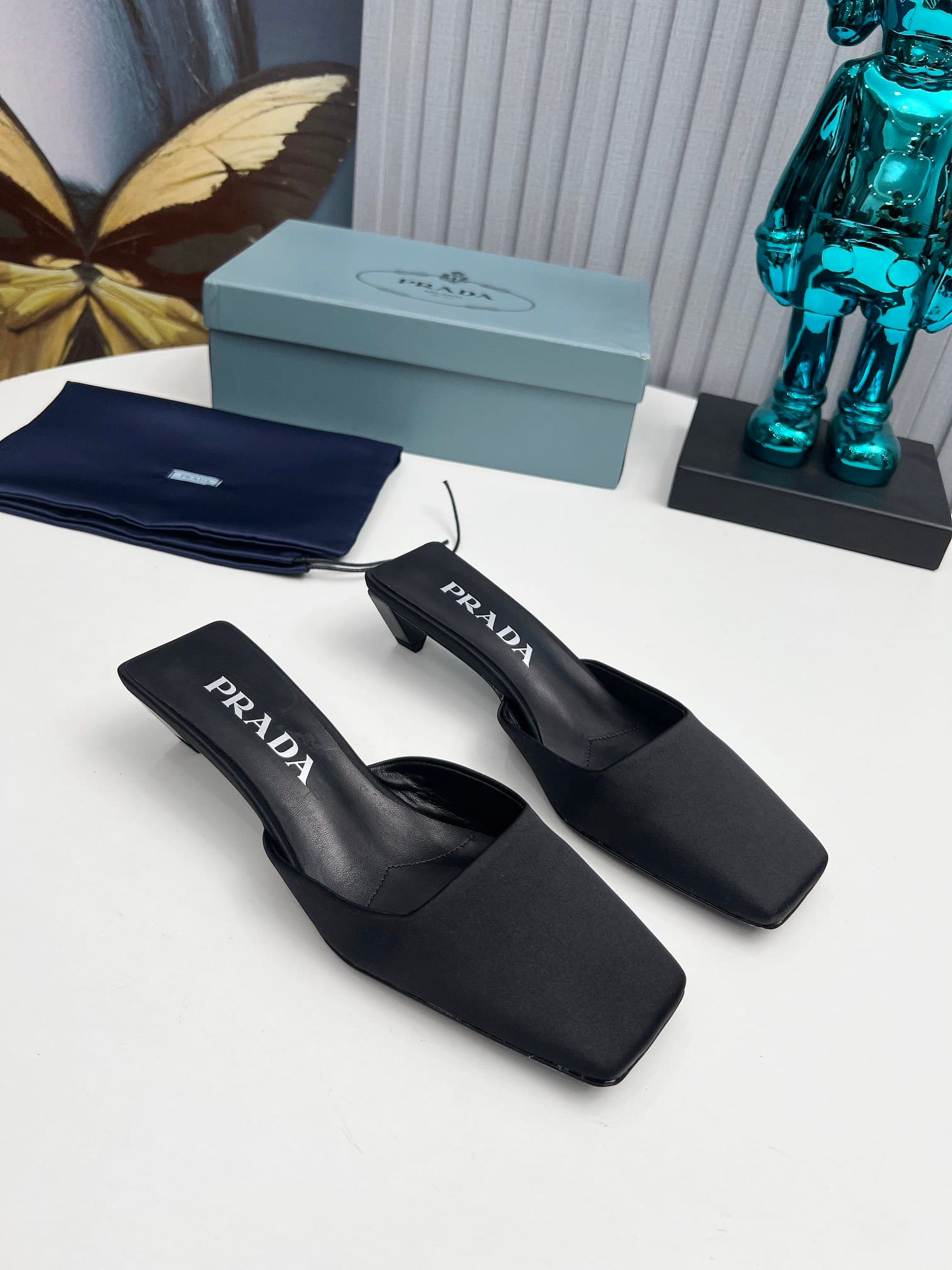 Pra*a Leather Mules Black